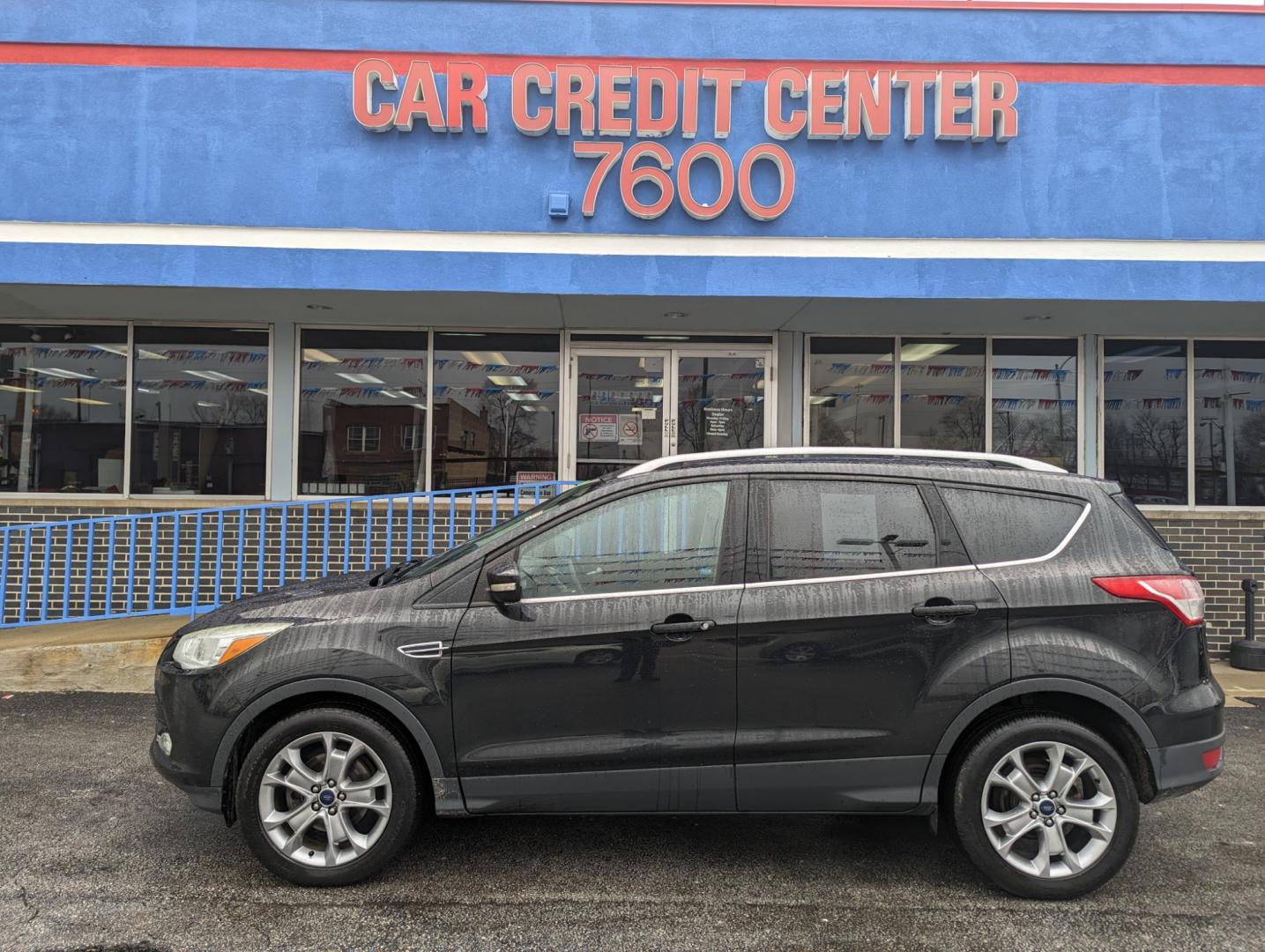 2015 BLACK Ford Escape Titanium FWD (1FMCU0JX9FU) with an 1.6L L4 DOHC 16V engine, 6-Speed Automatic transmission, located at 7600 S Western Ave., Chicago, IL, 60620, (773) 918-3980, 0.000000, 0.000000 - Photo#0